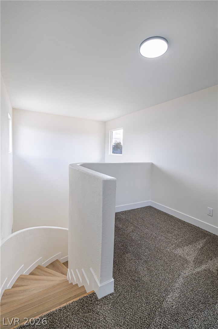 1891 Brian Road Pahrump, NV 89048 - Photo 26 of 50 Below grade area with baseboards and carpet