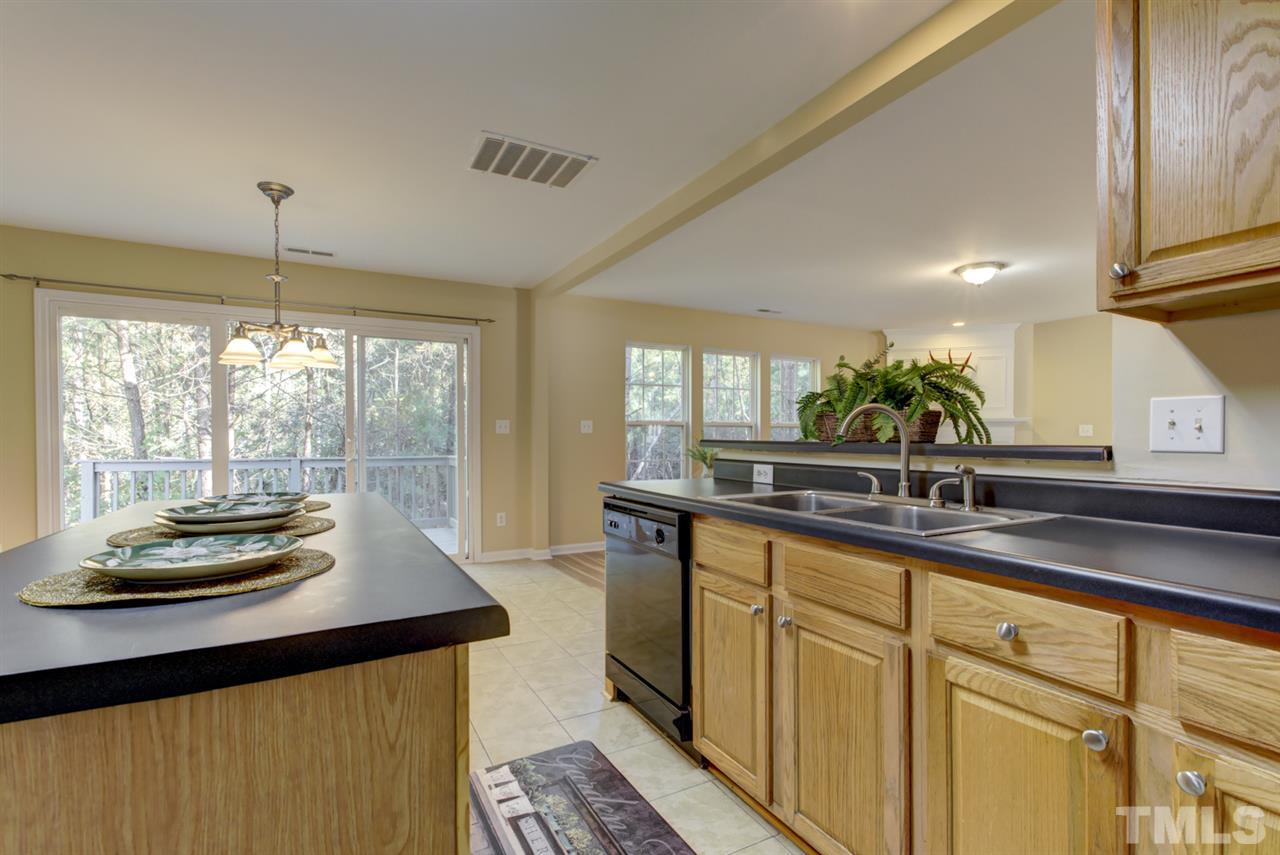 5056 Babbling Brook Drive Raleigh, NC 27610 - Photo 28 of 28 open floor plan for entertaining and cooking