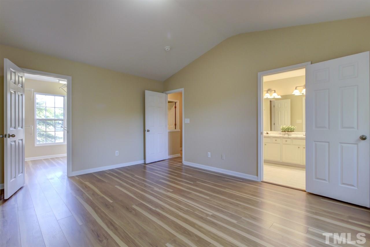 5056 Babbling Brook Drive Raleigh, NC 27610 - Photo 14 of 28 wood floor throughout