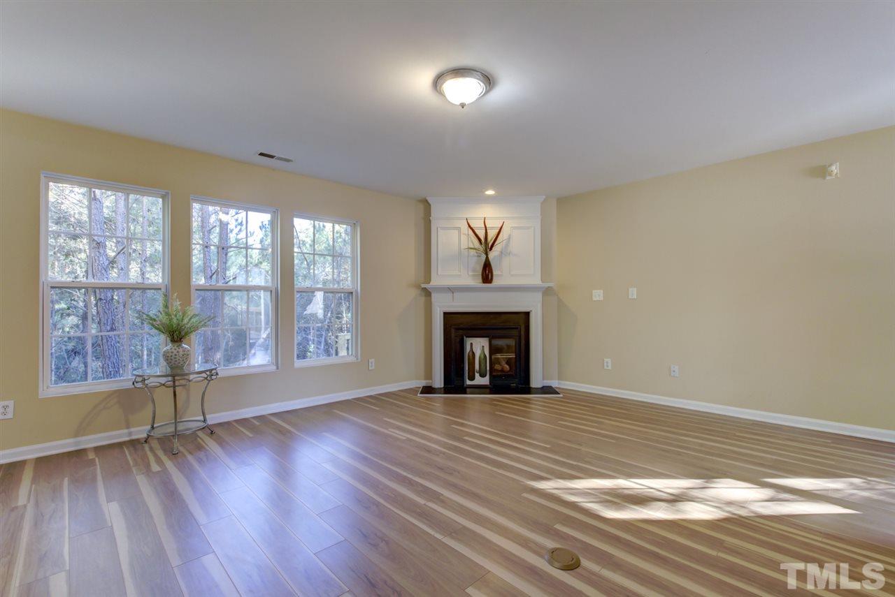 5056 Babbling Brook Drive Raleigh, NC 27610 - Photo 6 of 28 Huge living room for your entertainments and gathering
