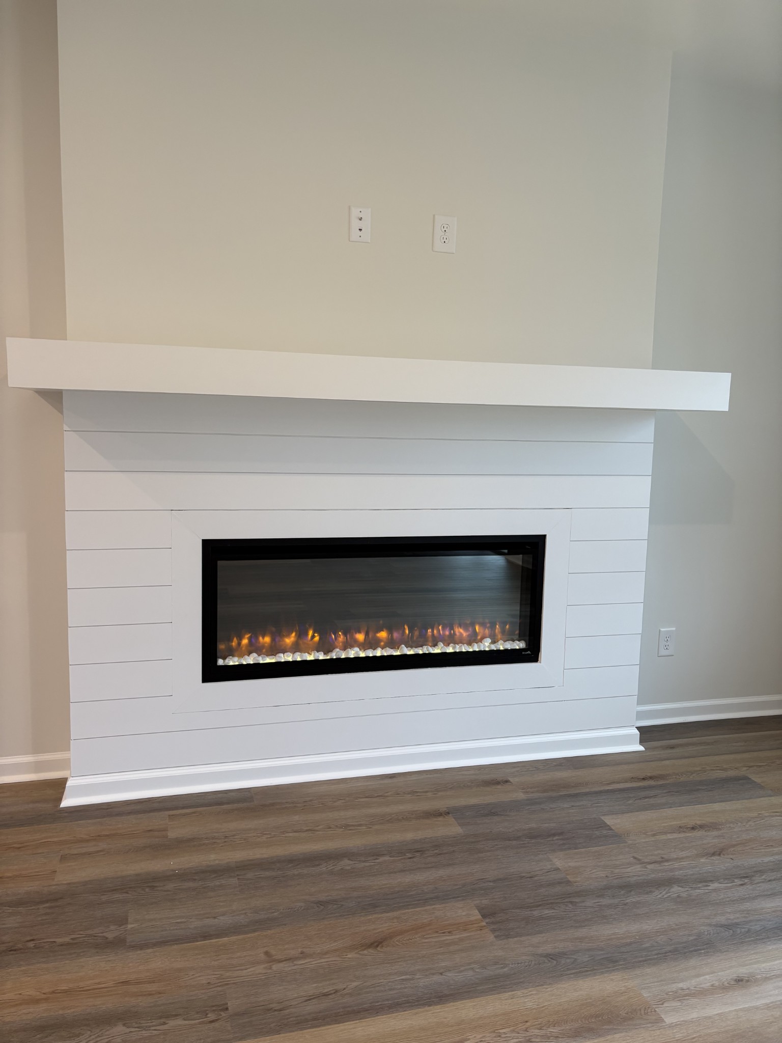 2136 Cheltenham Place Columbia, TN 38401 - Photo 13 of 31 a living room with a fireplace and a wooden floor