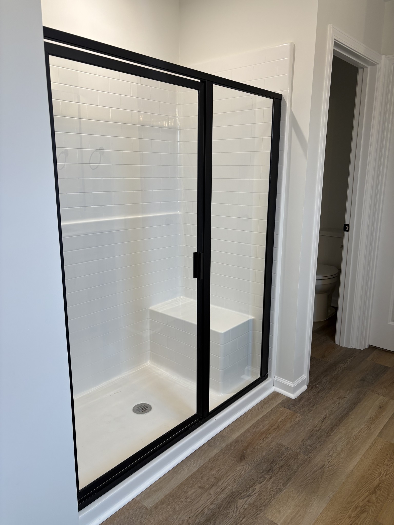 2136 Cheltenham Place Columbia, TN 38401 - Photo 16 of 31 a bathroom with a glass shower door