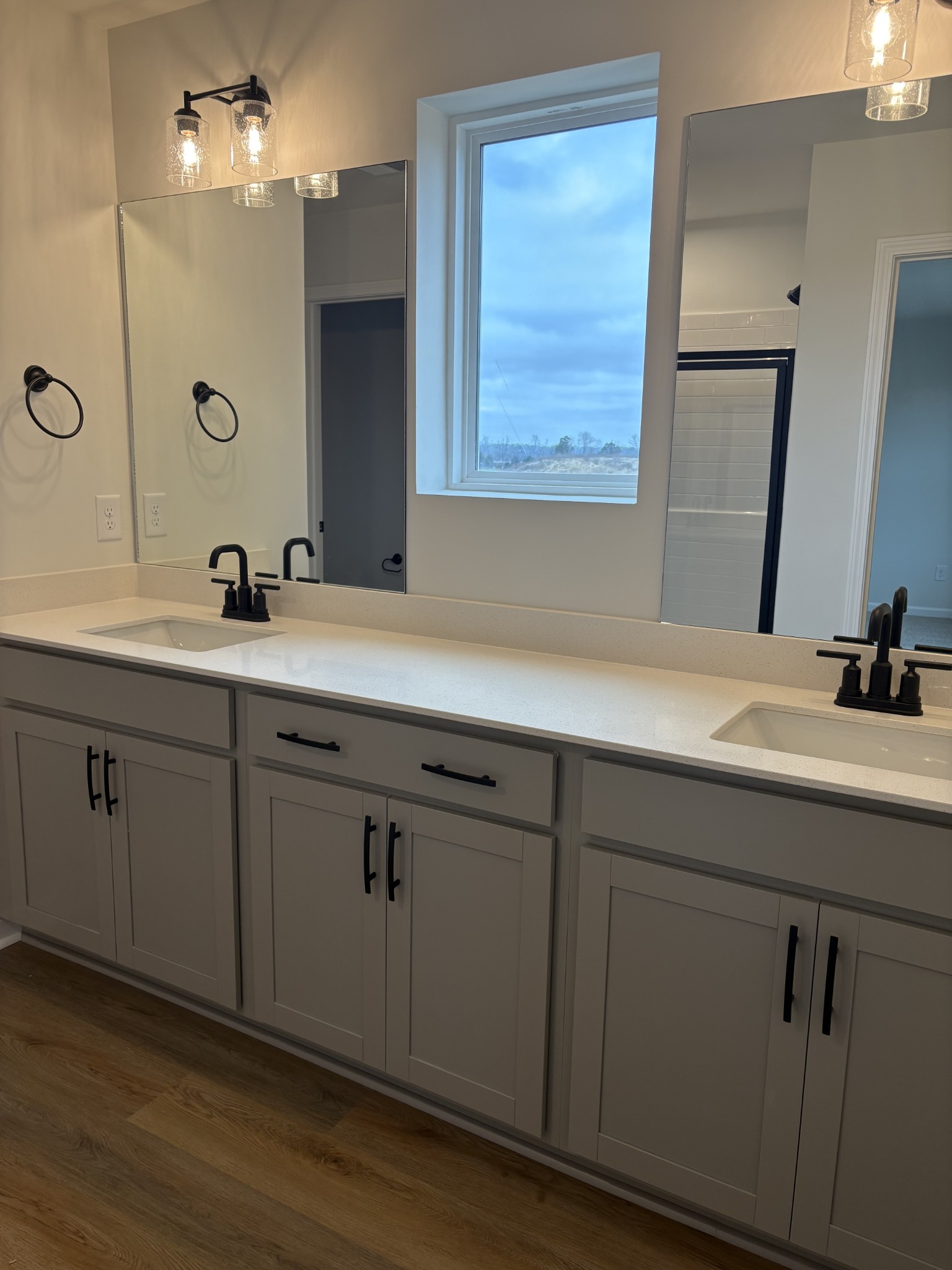 2136 Cheltenham Place Columbia, TN 38401 - Photo 17 of 31 a bathroom with a double vanity sink and a mirror