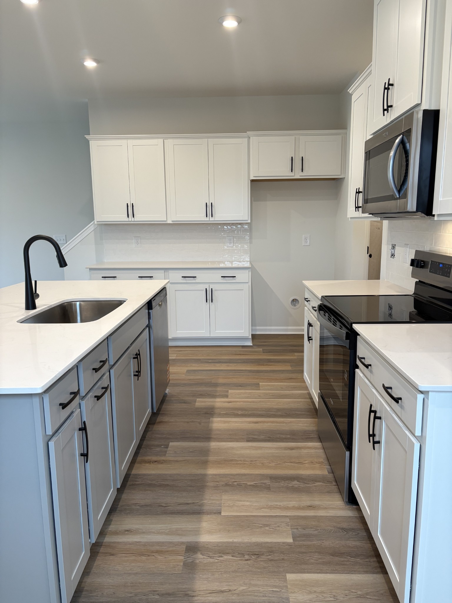 2136 Cheltenham Place Columbia, TN 38401 - Photo 9 of 31 a kitchen with stainless steel appliances granite countertop a white cabinets and sink