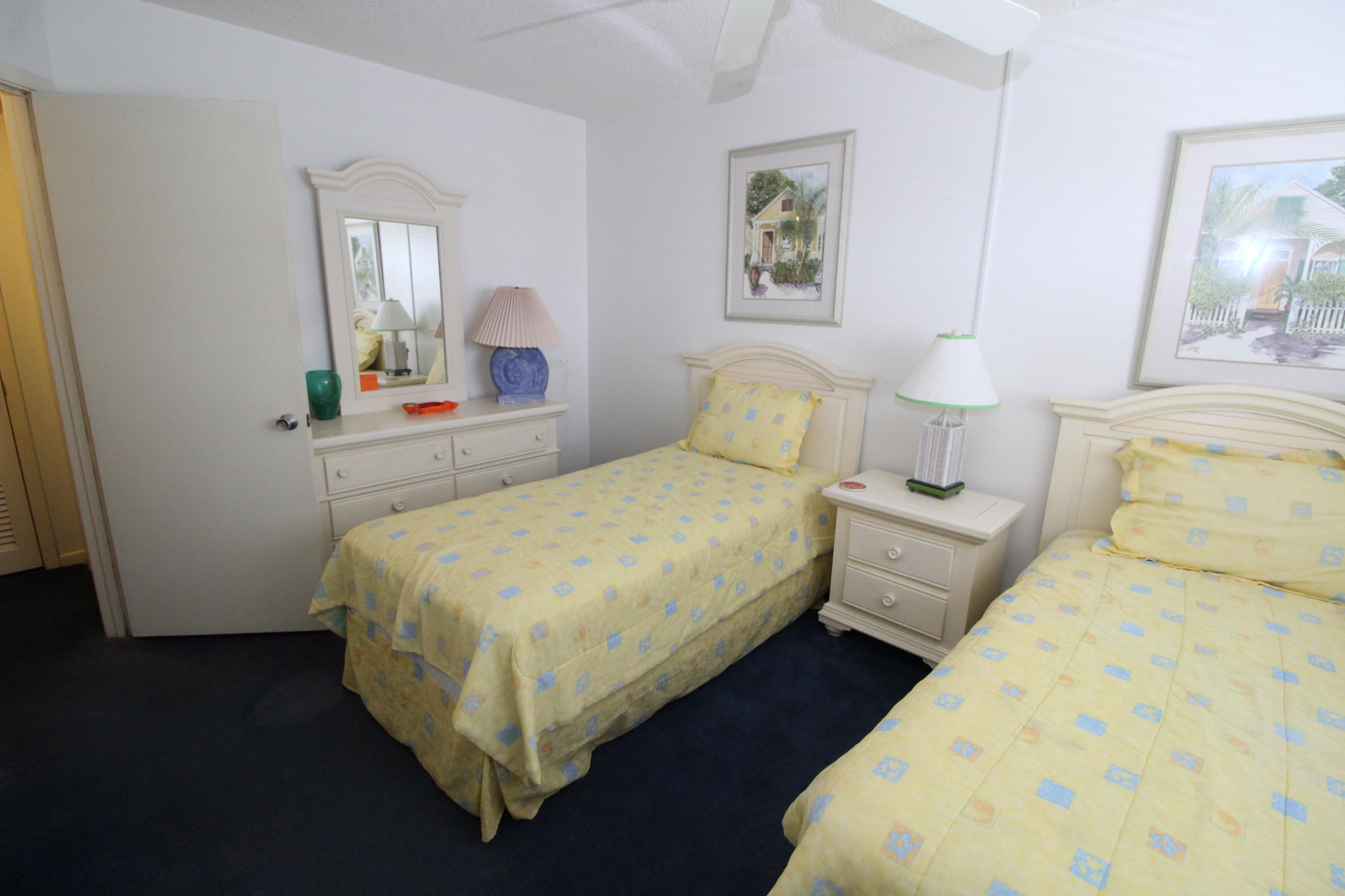 909 Santa Rosa Boulevard, Unit 548 Fort Walton Beach, FL 32548 - Photo 13 of 22 a bedroom with bed and a window