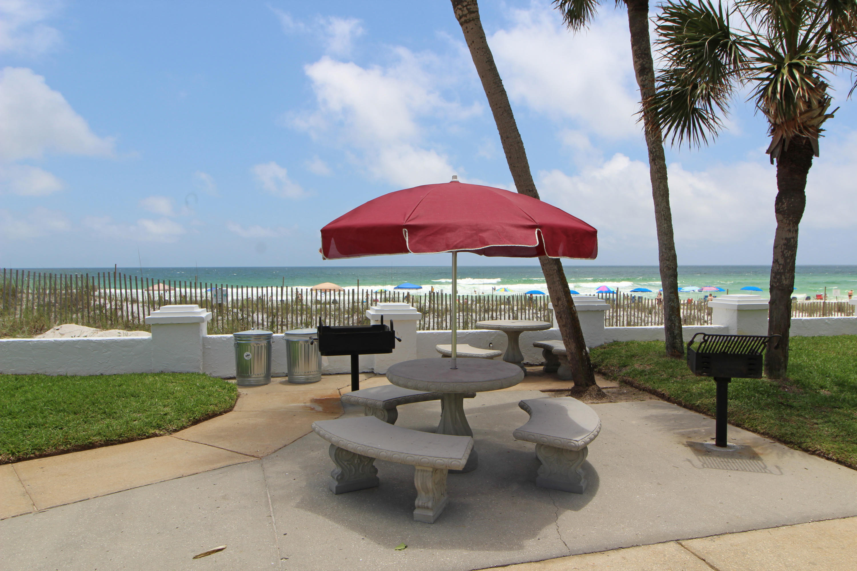 909 Santa Rosa Boulevard, Unit 548 Fort Walton Beach, FL 32548 - Photo 17 of 22 a view of a patio with chairs and a patio