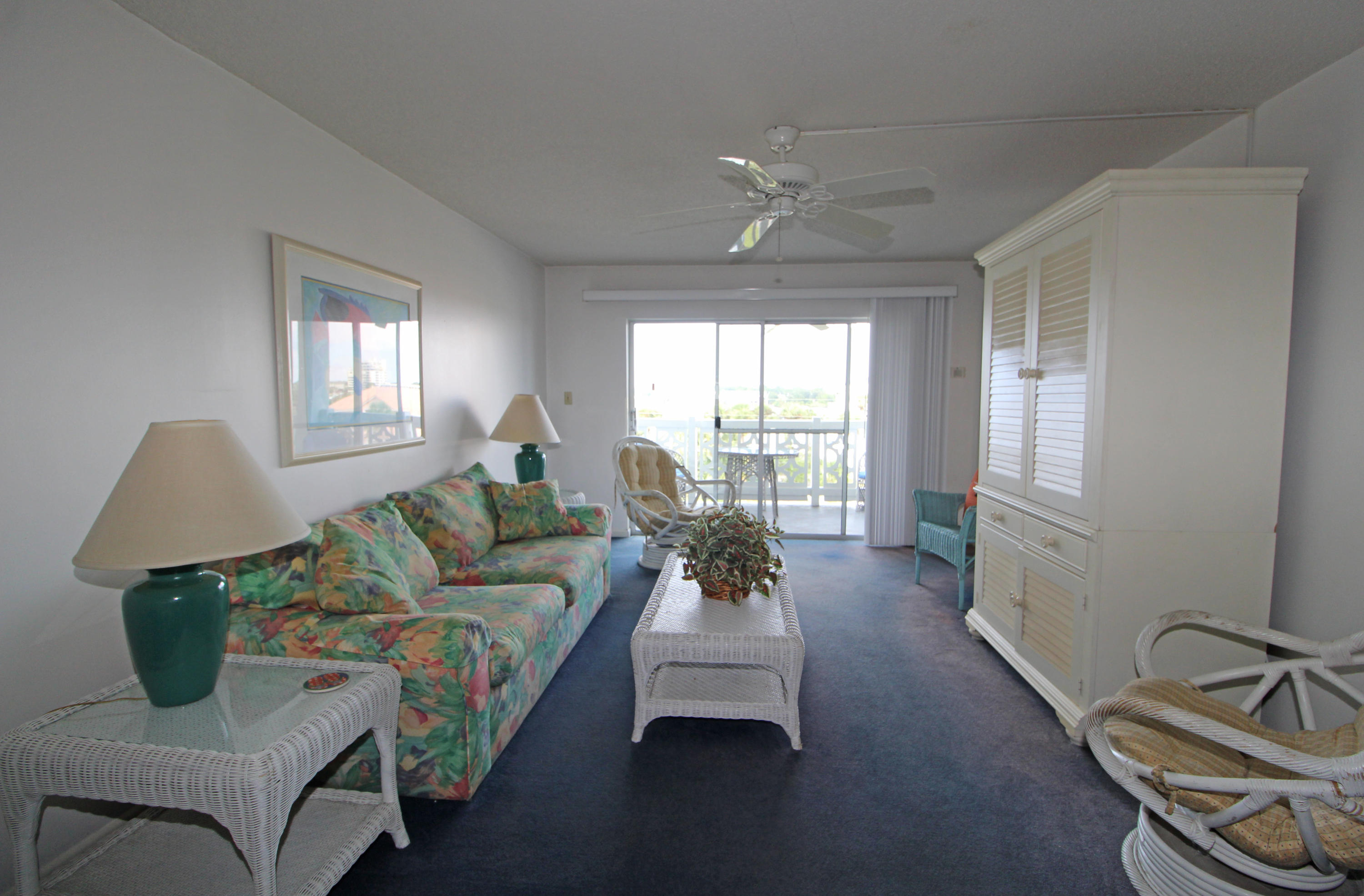 909 Santa Rosa Boulevard, Unit 548 Fort Walton Beach, FL 32548 - Photo 4 of 22 a living room with furniture and a large window