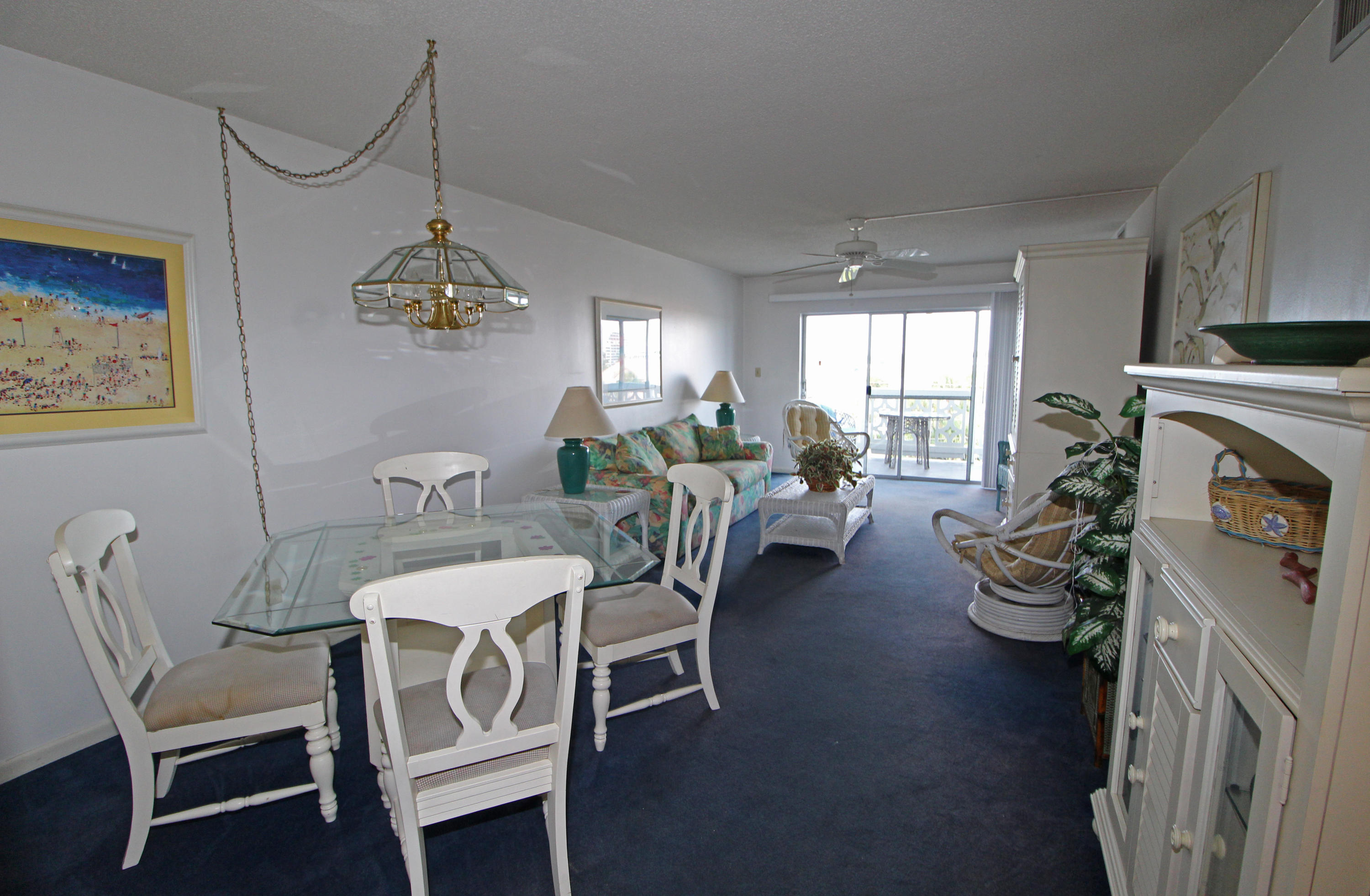 909 Santa Rosa Boulevard, Unit 548 Fort Walton Beach, FL 32548 - Photo 5 of 22 a view of a dining room with furniture window and wooden floor