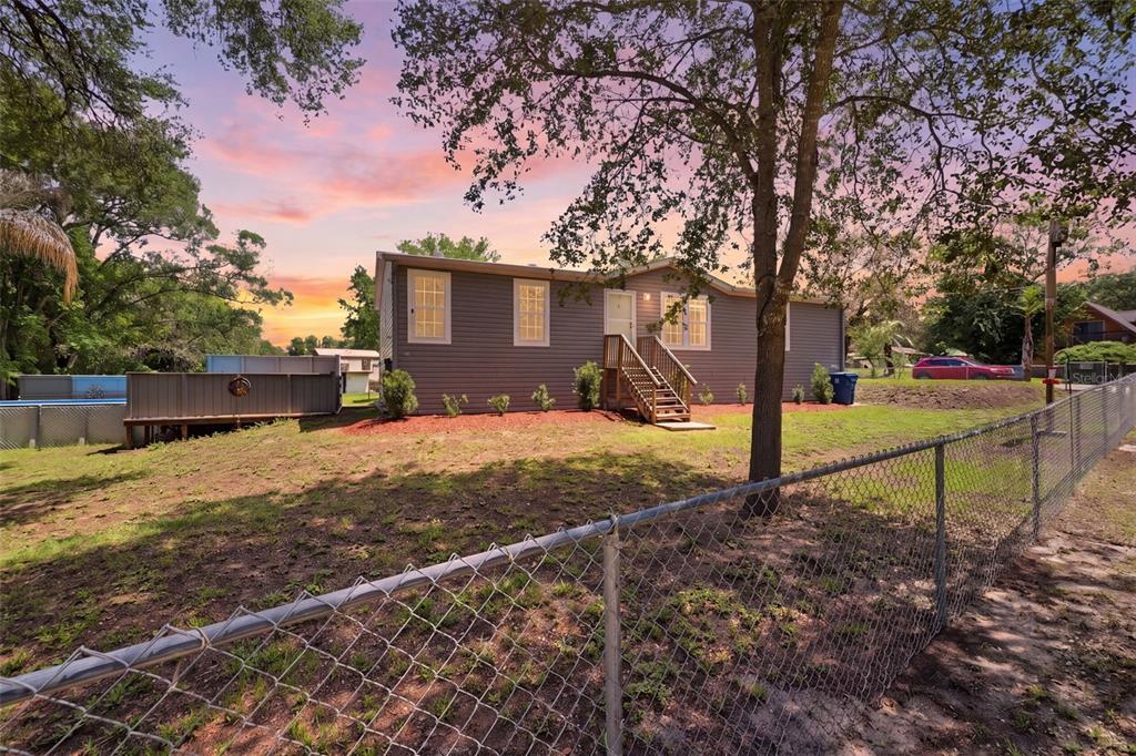 3183 Cedley Road Dade City, FL 33523 - Photo 1 of 48 a house view with a backyard space
