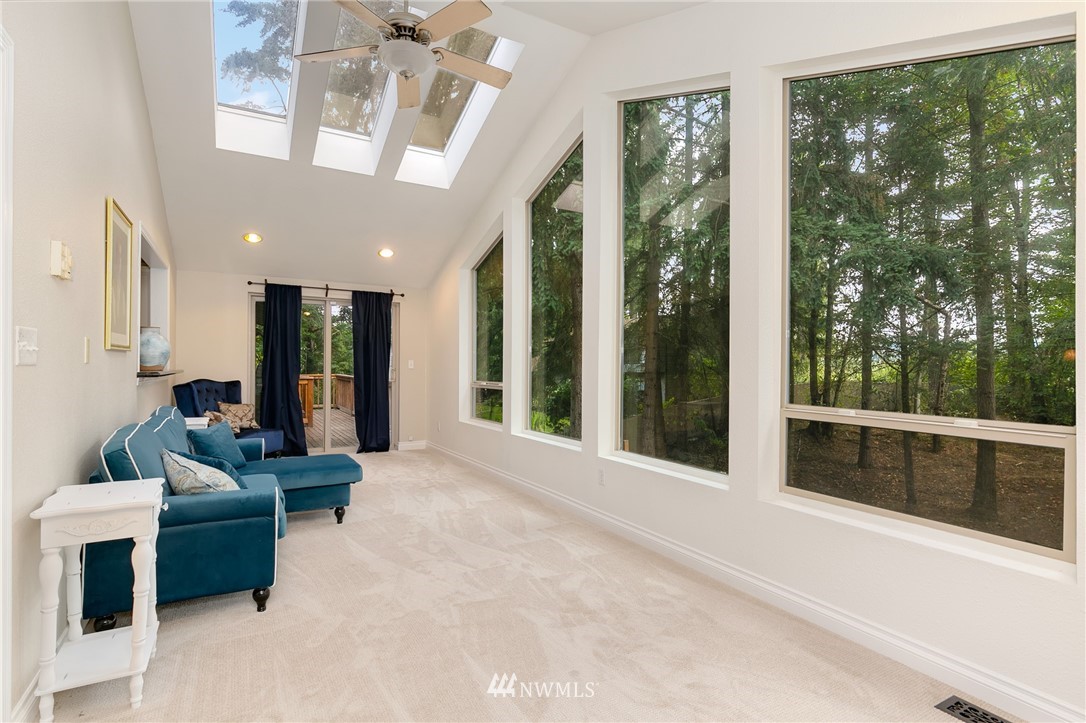 24303 23rd Avenue West Bothell, WA 98021 - Photo 9 of 25 a living room with furniture and windows