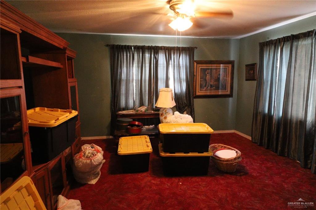 7716 North Val Verde Road Donna, TX 78537 - Photo 16 of 17 a living room with furniture and a window