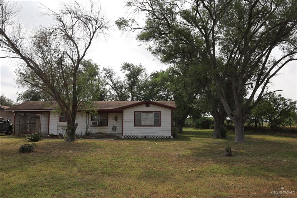 7716 North Val Verde Road Donna, TX 78537 - Photo 17 of 17 a view of a house with a yard