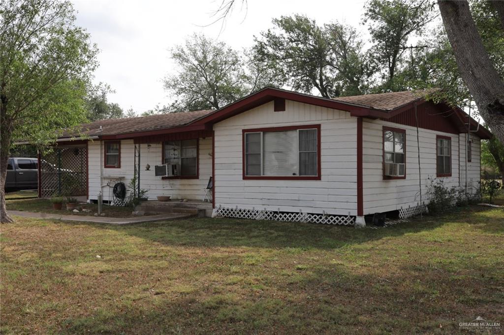 7716 North Val Verde Road Donna, TX 78537 - Photo 6 of 17 a view of a house with a yard