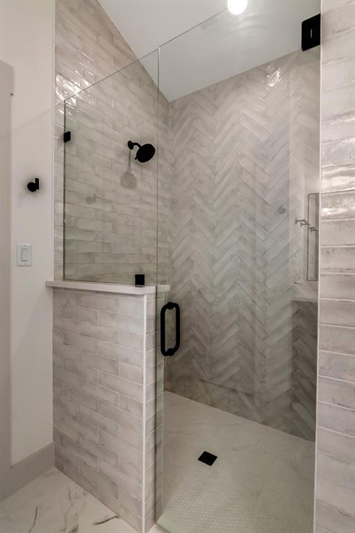 205 West 7th Street Justin, TX 76247 - Photo 22 of 35 a bathroom with a shower