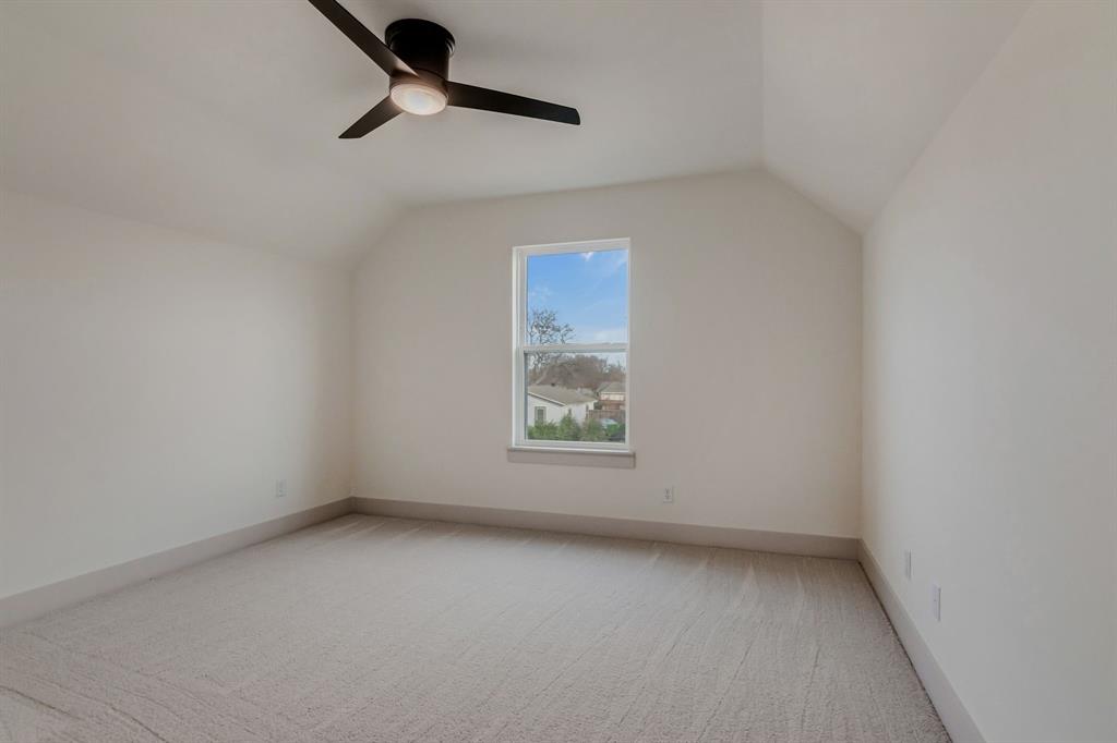 205 West 7th Street Justin, TX 76247 - Photo 29 of 35 an empty room with a window