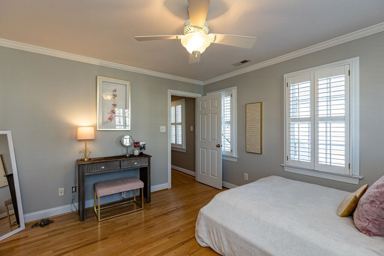 117 Kingsport Road Holly Springs, NC 27540 - Photo 17 of 41 Hardwoods, private bath access. crown molding, plantation shutters, large closet and fan. Bedroom