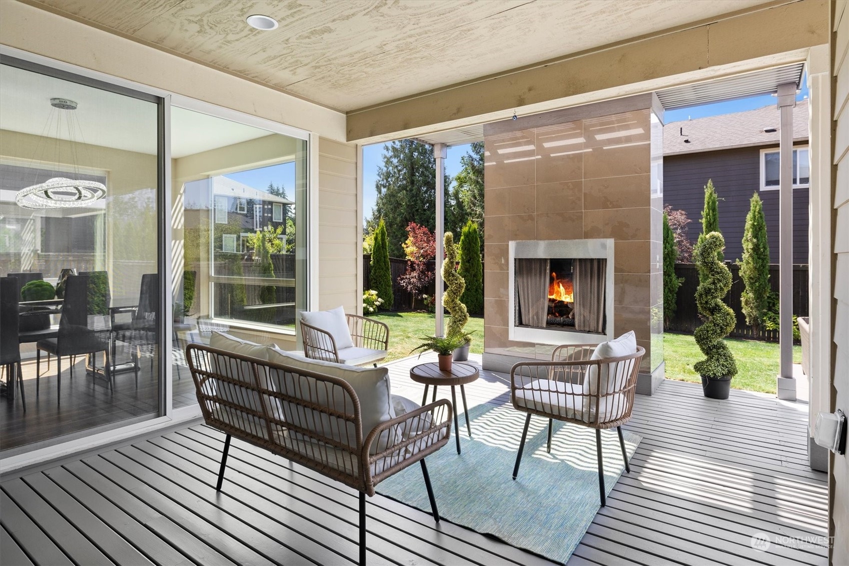3835 Northeast 24th Court Renton, WA 98056 - Photo 19 of 40 a building outdoor space with patio furniture and potted plants