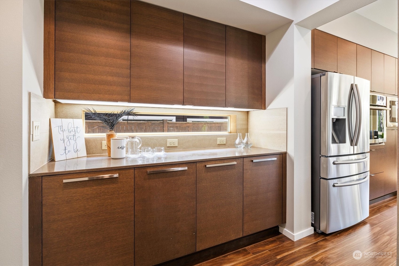 3835 Northeast 24th Court Renton, WA 98056 - Photo 20 of 40 a kitchen with stainless steel appliances granite countertop a refrigerator and a sink
