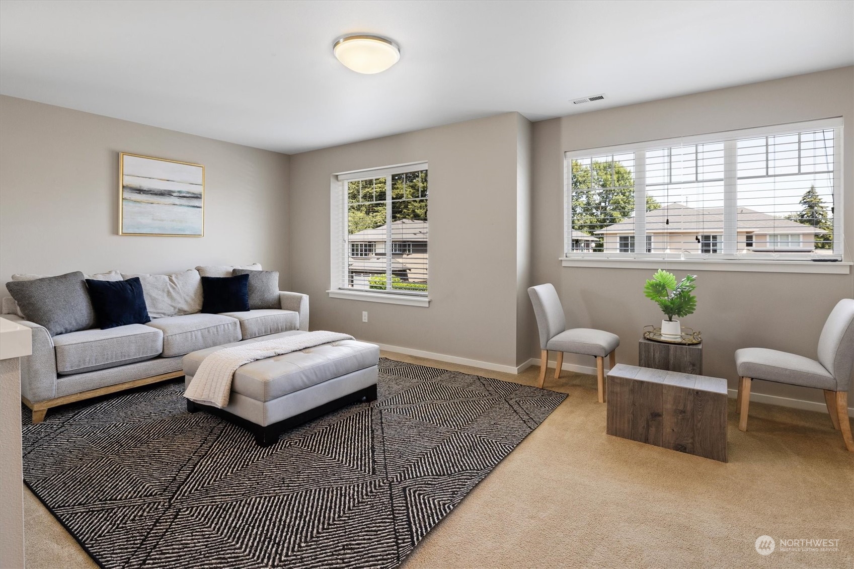 3835 Northeast 24th Court Renton, WA 98056 - Photo 23 of 40 a living room with furniture and a large window