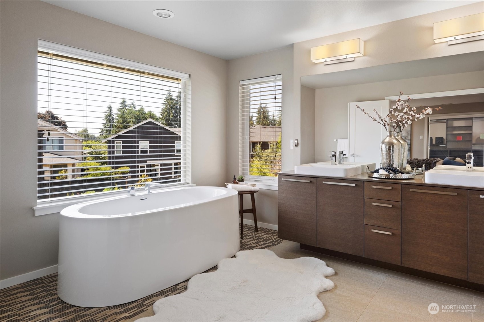 3835 Northeast 24th Court Renton, WA 98056 - Photo 27 of 40 a spacious bathroom with sink and mirror