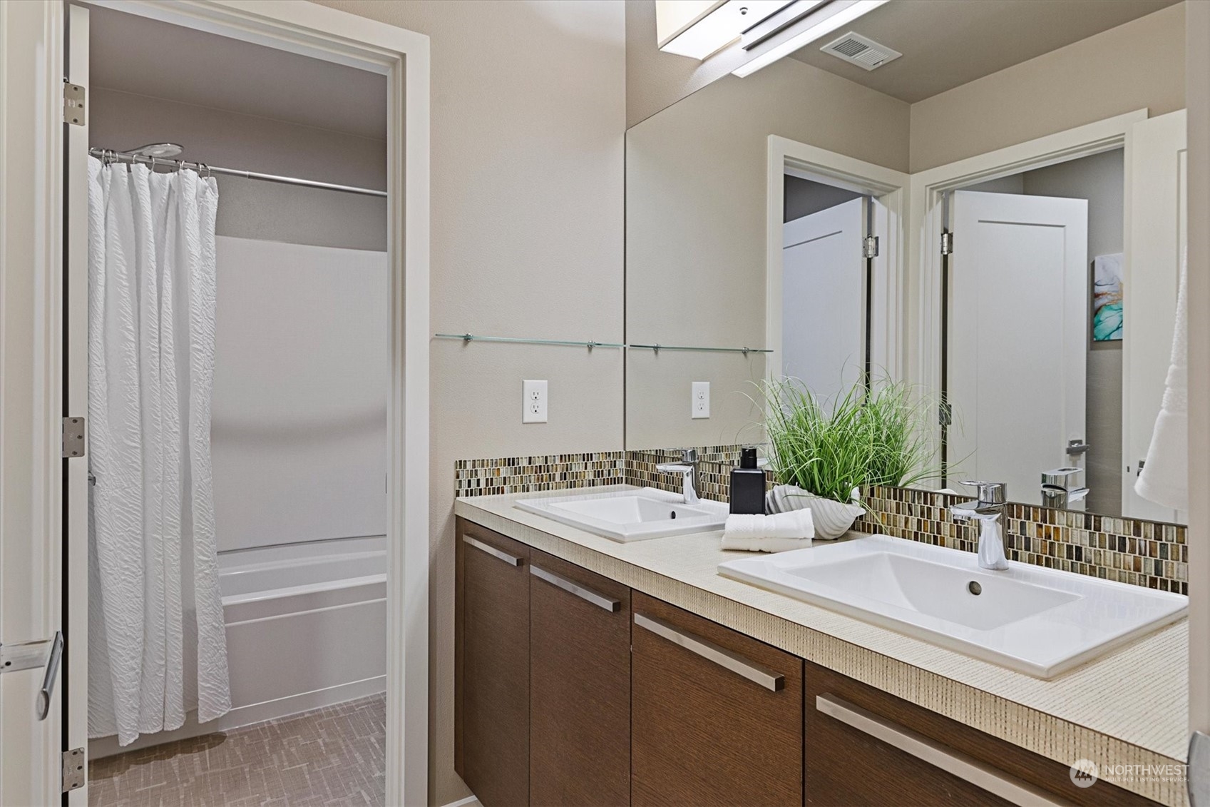 3835 Northeast 24th Court Renton, WA 98056 - Photo 30 of 40 a bathroom with a sink and a mirror
