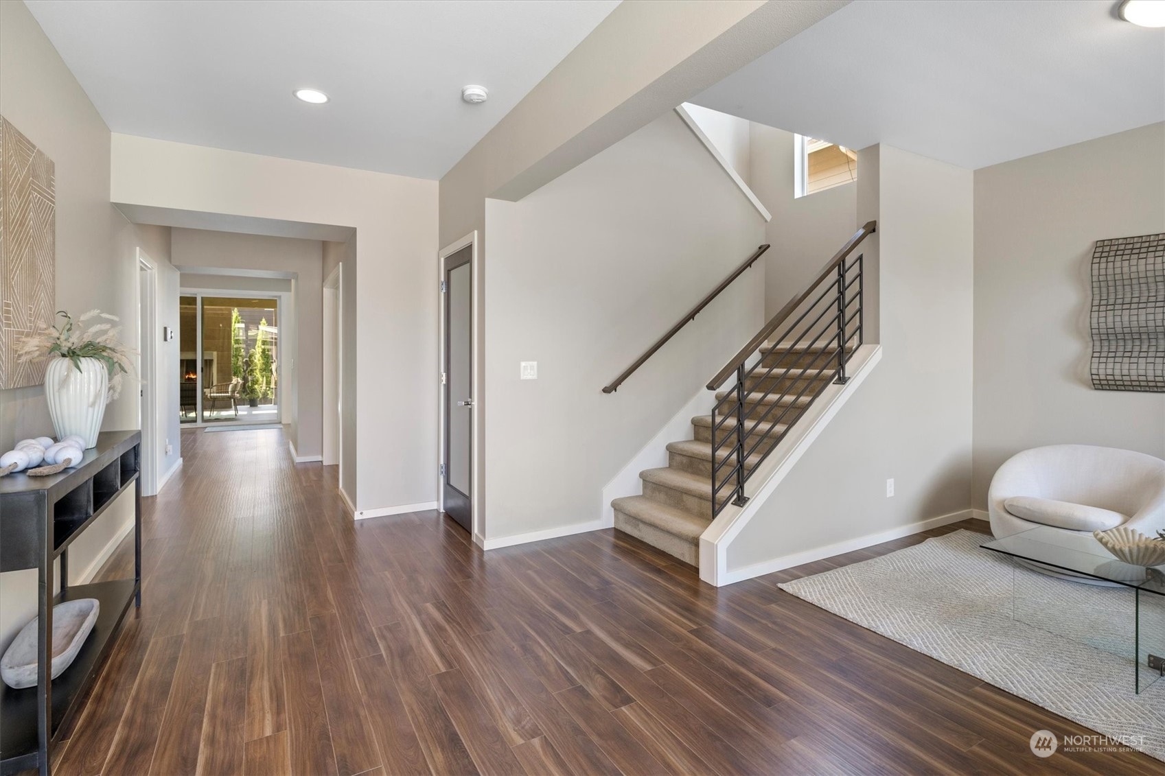 3835 Northeast 24th Court Renton, WA 98056 - Photo 5 of 40 a view of entryway and hall with wooden floor