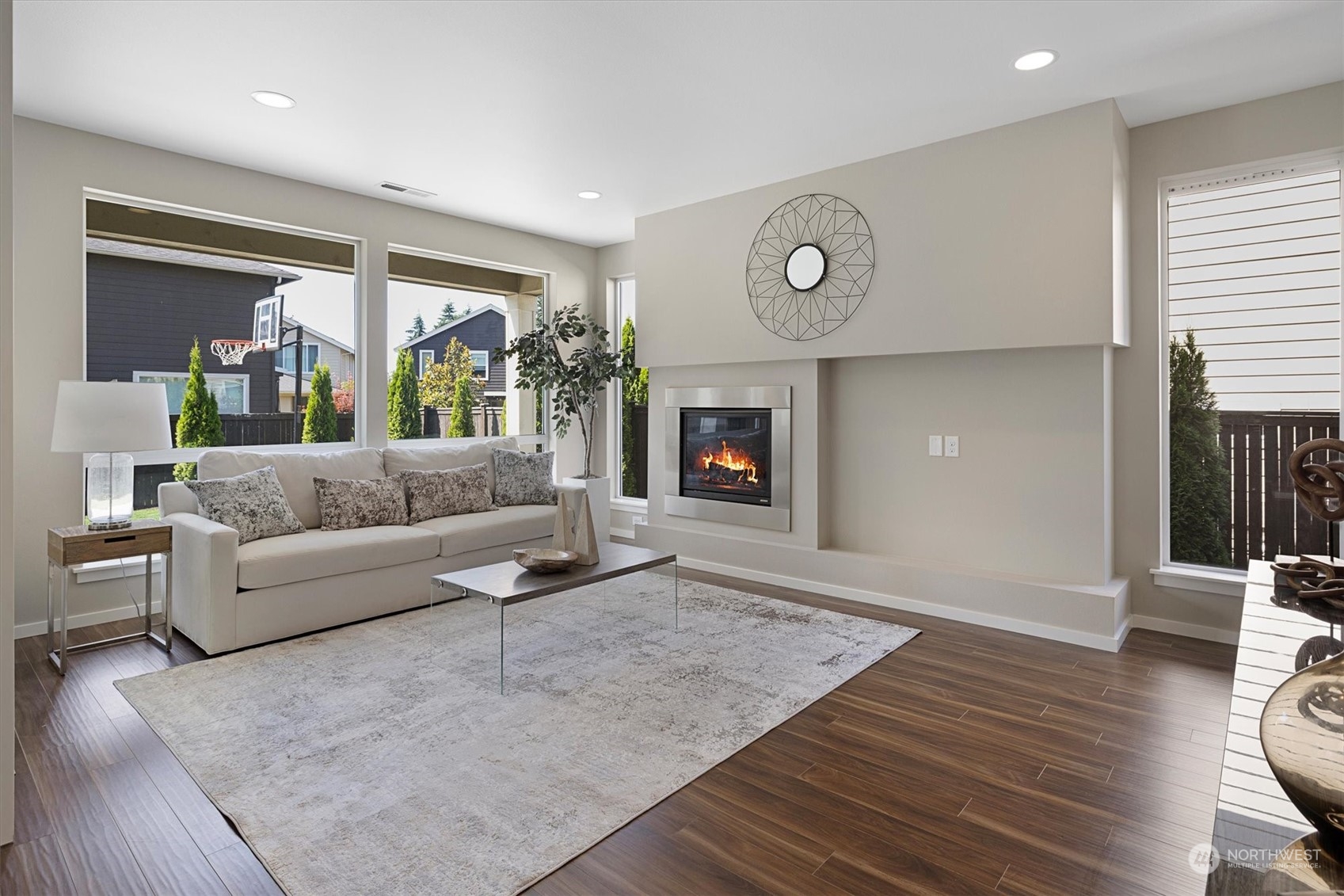 3835 Northeast 24th Court Renton, WA 98056 - Photo 8 of 40 a living room with furniture and a fireplace