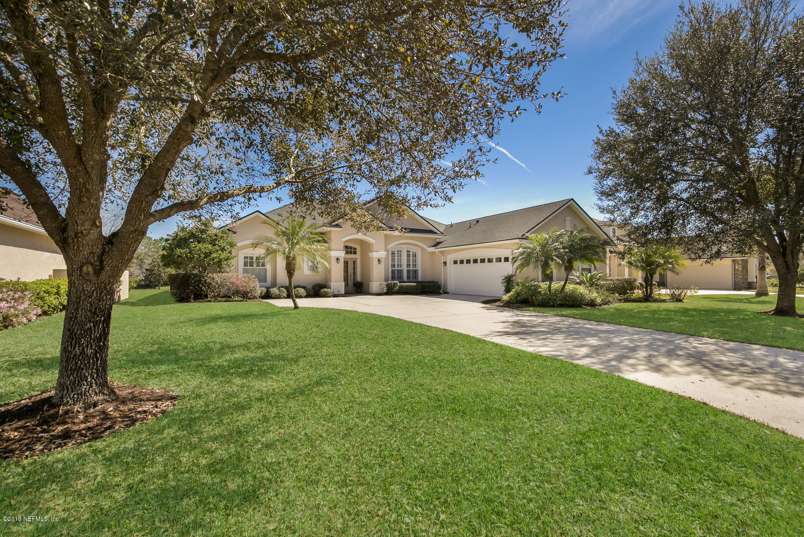 2034 River's Own Road St. Augustine, FL 32092 - Photo 1 of 40 a view of a yard with plants and trees