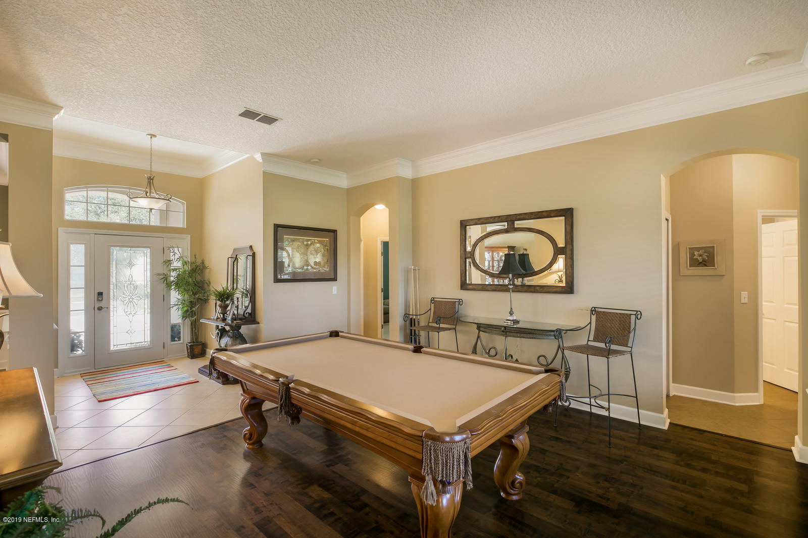 2034 River's Own Road St. Augustine, FL 32092 - Photo 11 of 40 a room with furniture and wooden floor