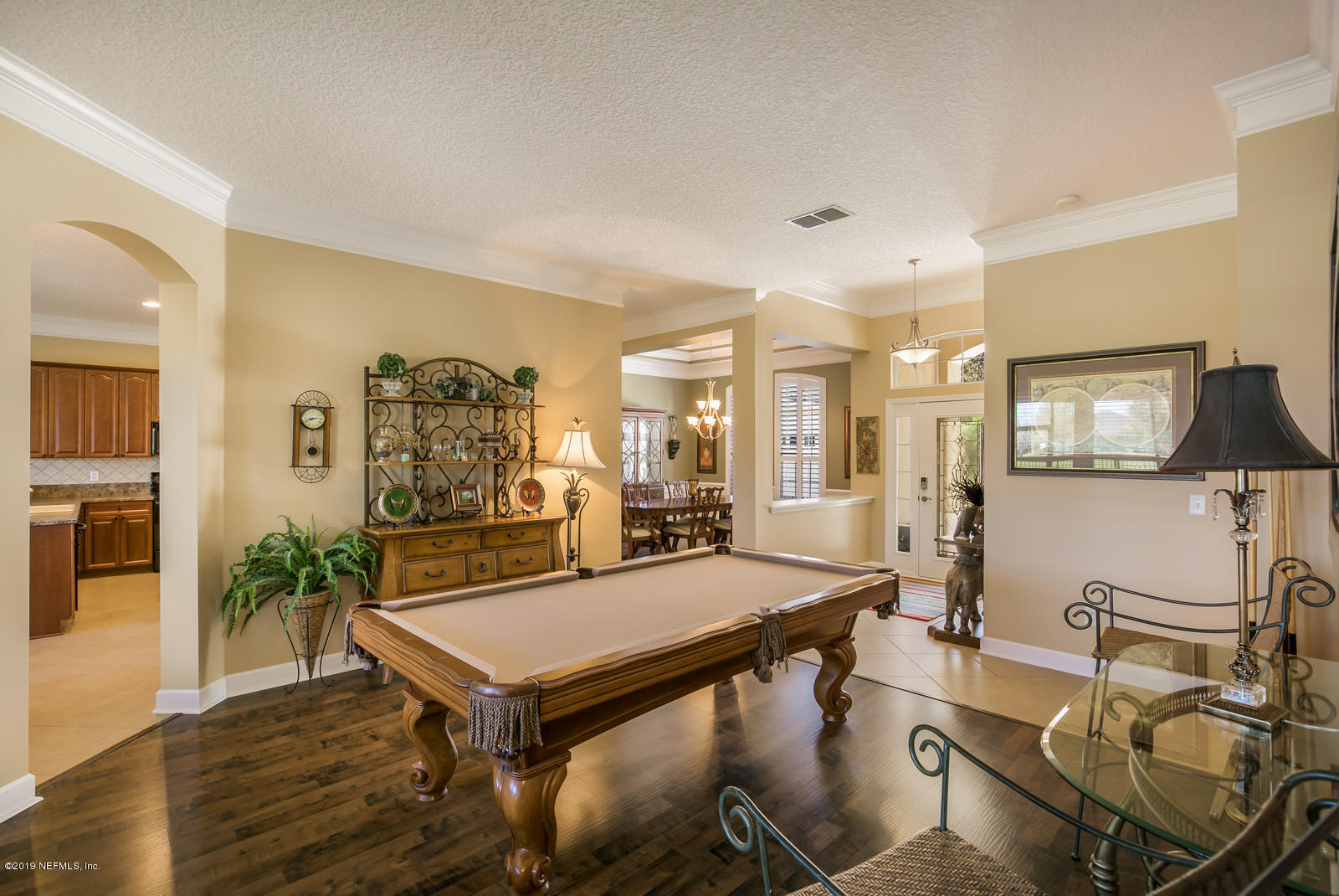 2034 River's Own Road St. Augustine, FL 32092 - Photo 12 of 40 a room with furniture and wooden floor