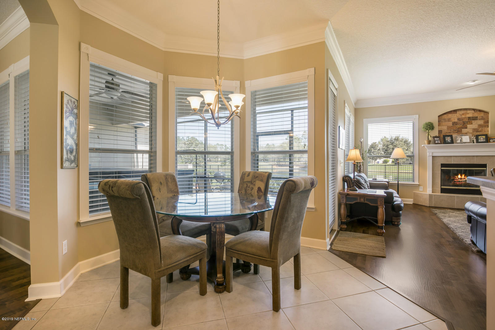 2034 River's Own Road St. Augustine, FL 32092 - Photo 14 of 40 a view of a dining room with furniture window and outside view