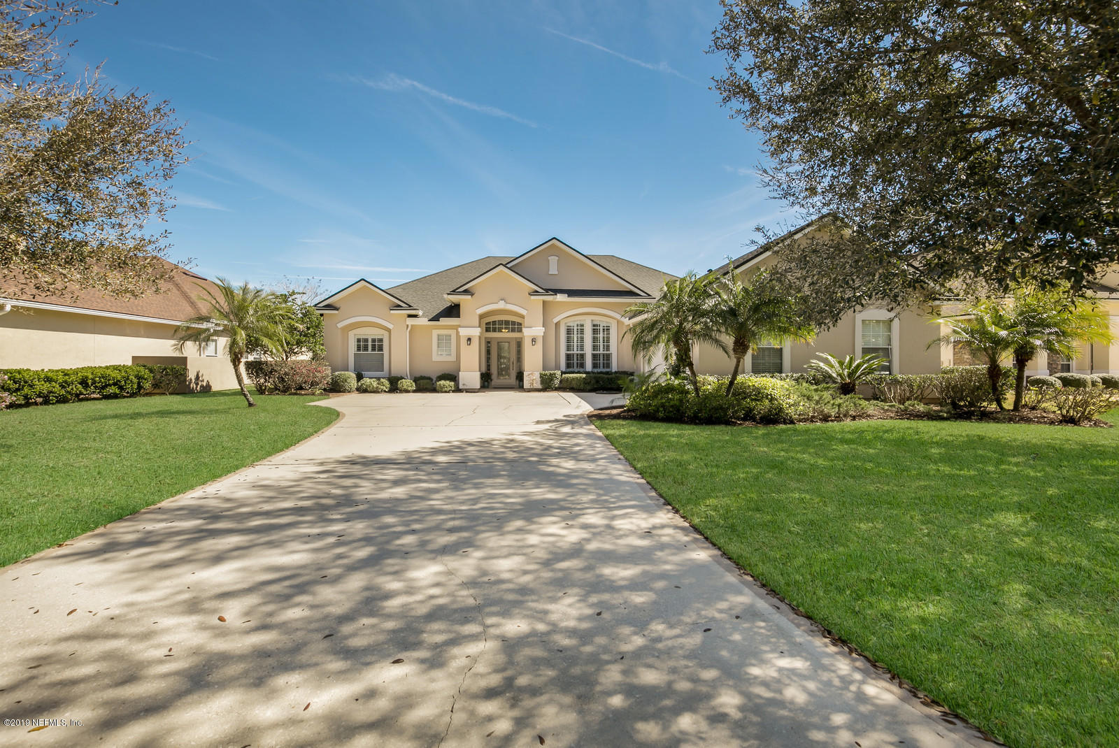 2034 River's Own Road St. Augustine, FL 32092 - Photo 2 of 40 a front view of a house with a yard