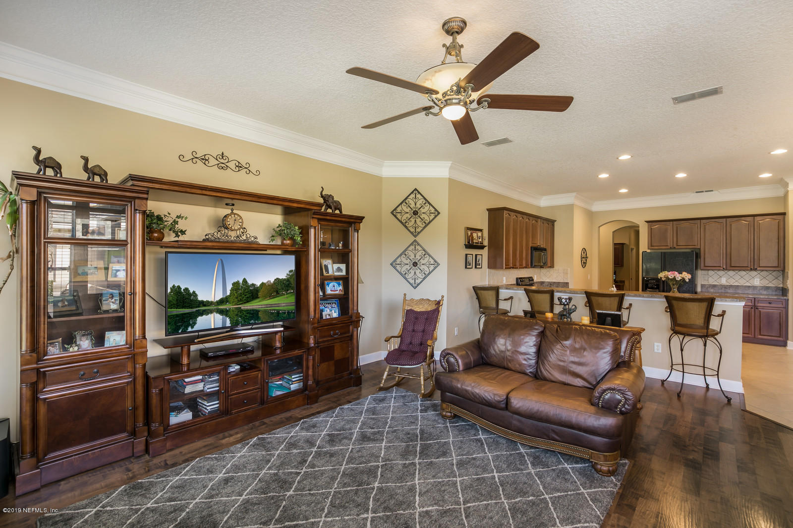 2034 River's Own Road St. Augustine, FL 32092 - Photo 22 of 40 a living room with furniture and a flat screen tv