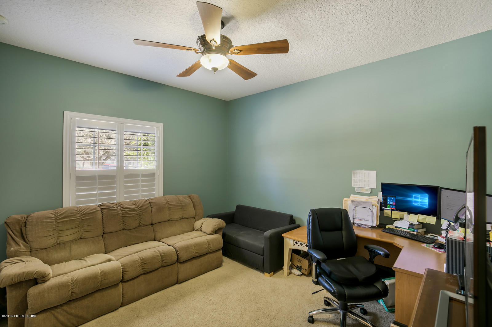 2034 River's Own Road St. Augustine, FL 32092 - Photo 28 of 40 a living room with furniture and a window