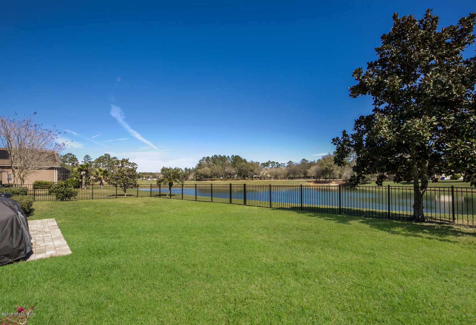 2034 River's Own Road St. Augustine, FL 32092 - Photo 34 of 40 a view of a field of grass and trees