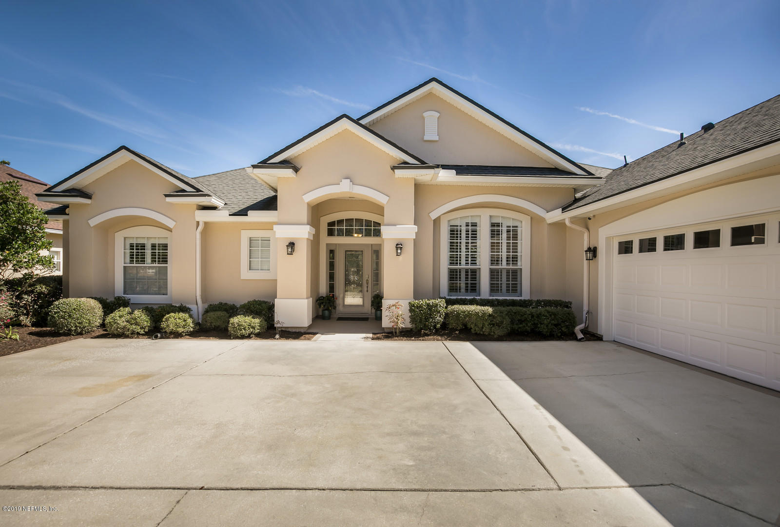 2034 River's Own Road St. Augustine, FL 32092 - Photo 4 of 40 a front view of a house with a yard