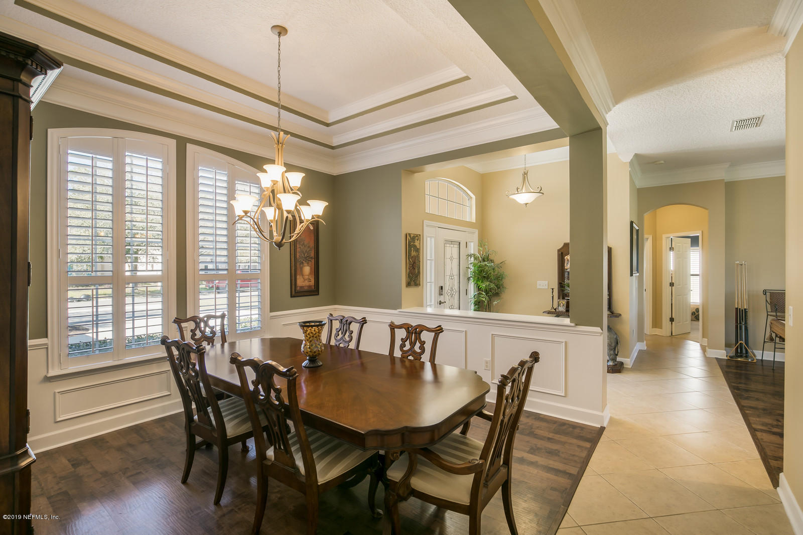 2034 River's Own Road St. Augustine, FL 32092 - Photo 7 of 40 a view of a a dining room with furniture window and wooden floor