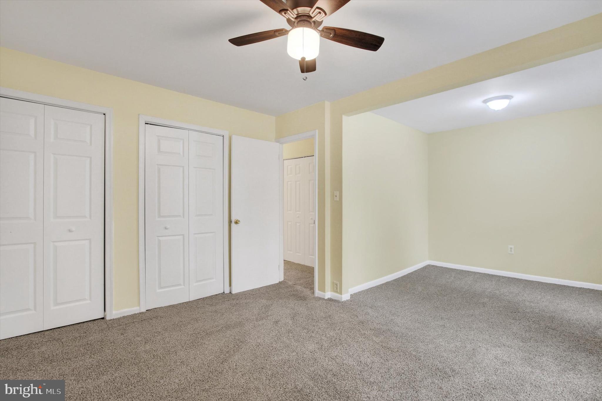 108 Walnut Street Steelton, PA 17113 - Photo 14 of 26 a view of an empty room and chandelier fan