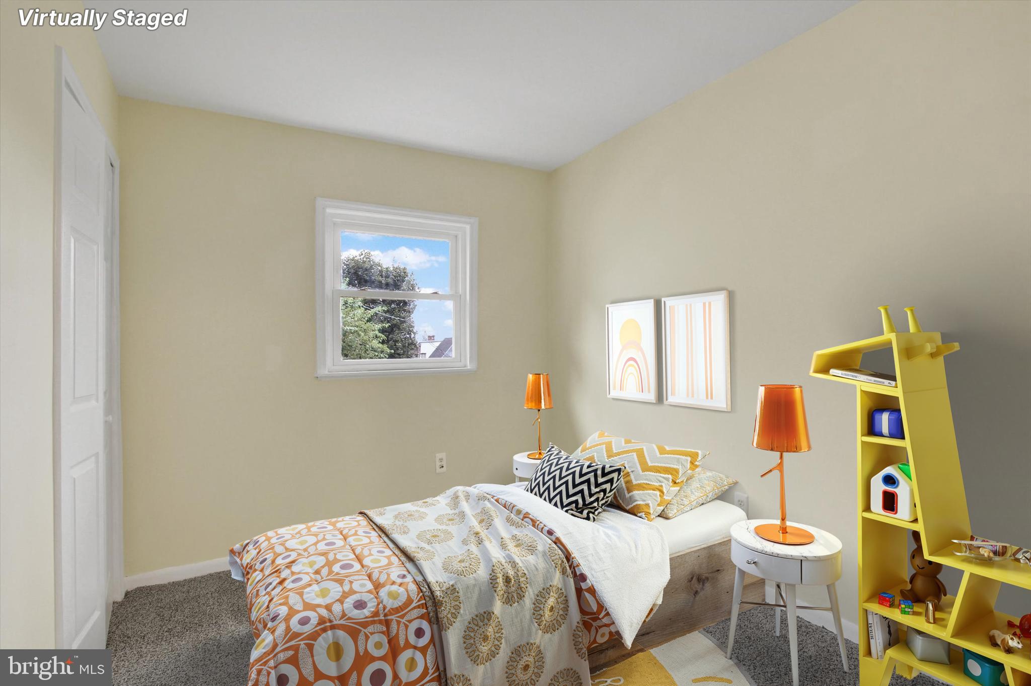 108 Walnut Street Steelton, PA 17113 - Photo 18 of 26 a bedroom with a bed and a window