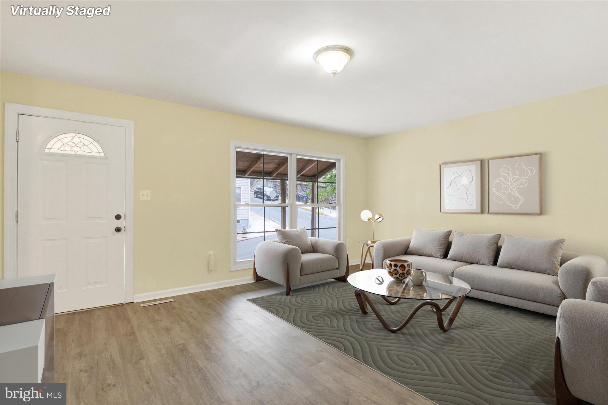 108 Walnut Street Steelton, PA 17113 - Photo 3 of 26 a living room with furniture and a window