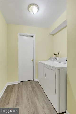 a bathroom with a sink vanity and a mirror