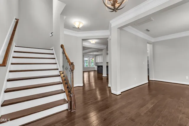 a view of entryway with wooden floor