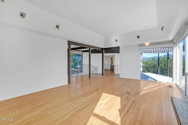 a view of an empty room and window