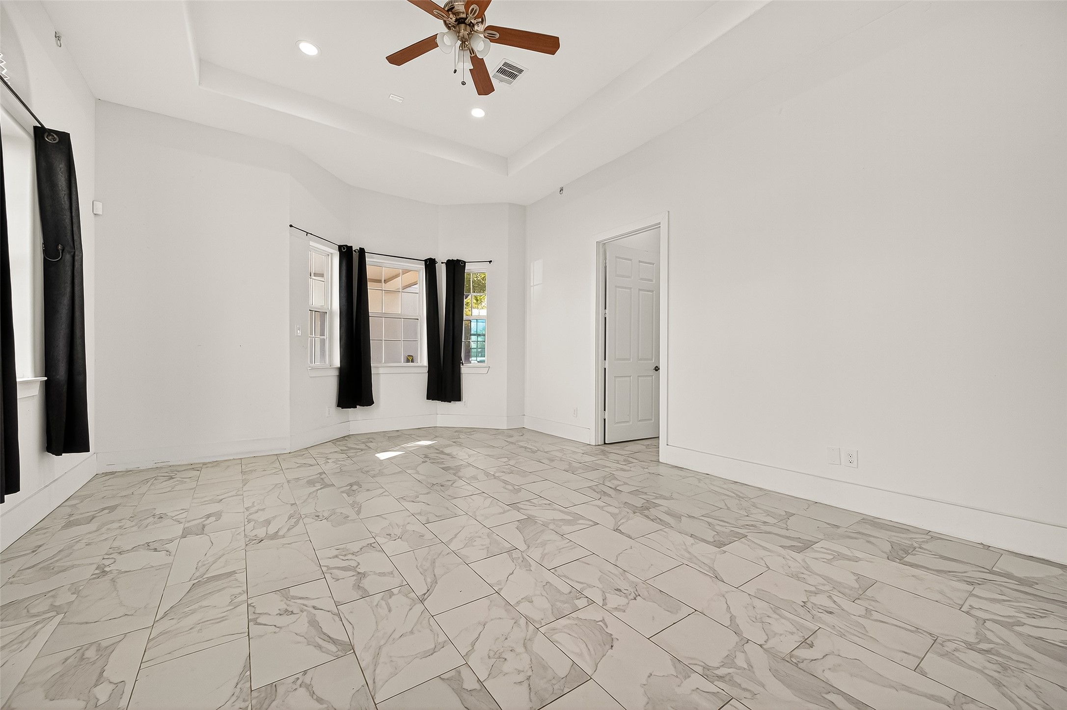 7915 Kirk Road Rosenberg, TX 77471 - Photo 11 of 46 a view of an empty room with a window