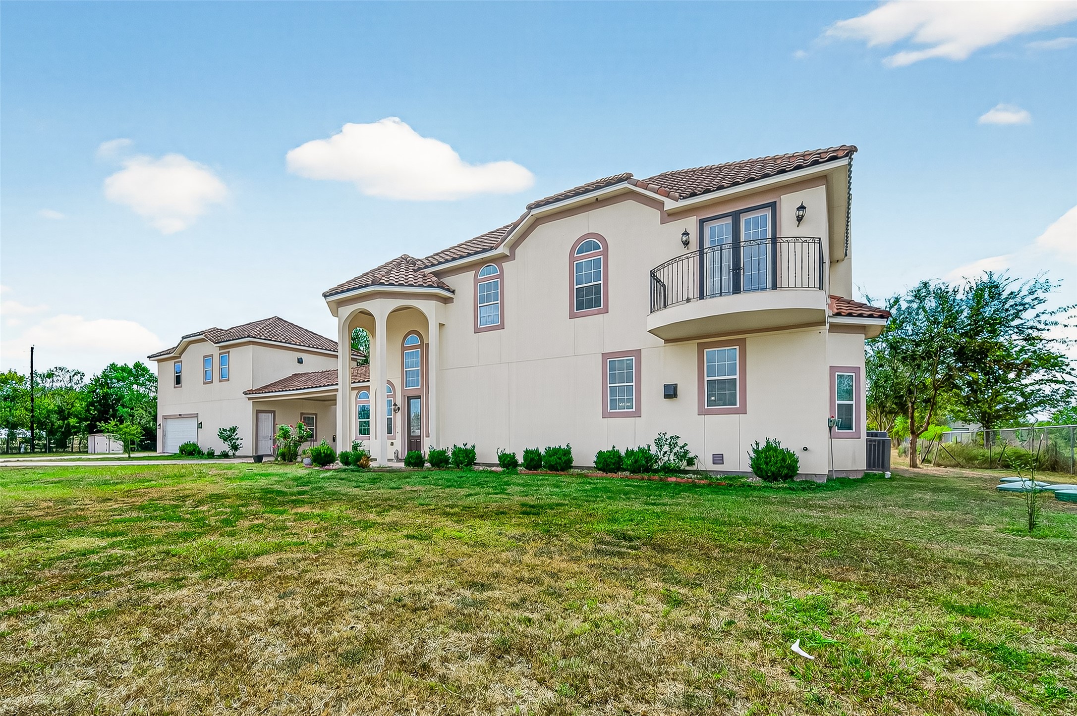 7915 Kirk Road Rosenberg, TX 77471 - Photo 2 of 46 a front view of a house with a yard