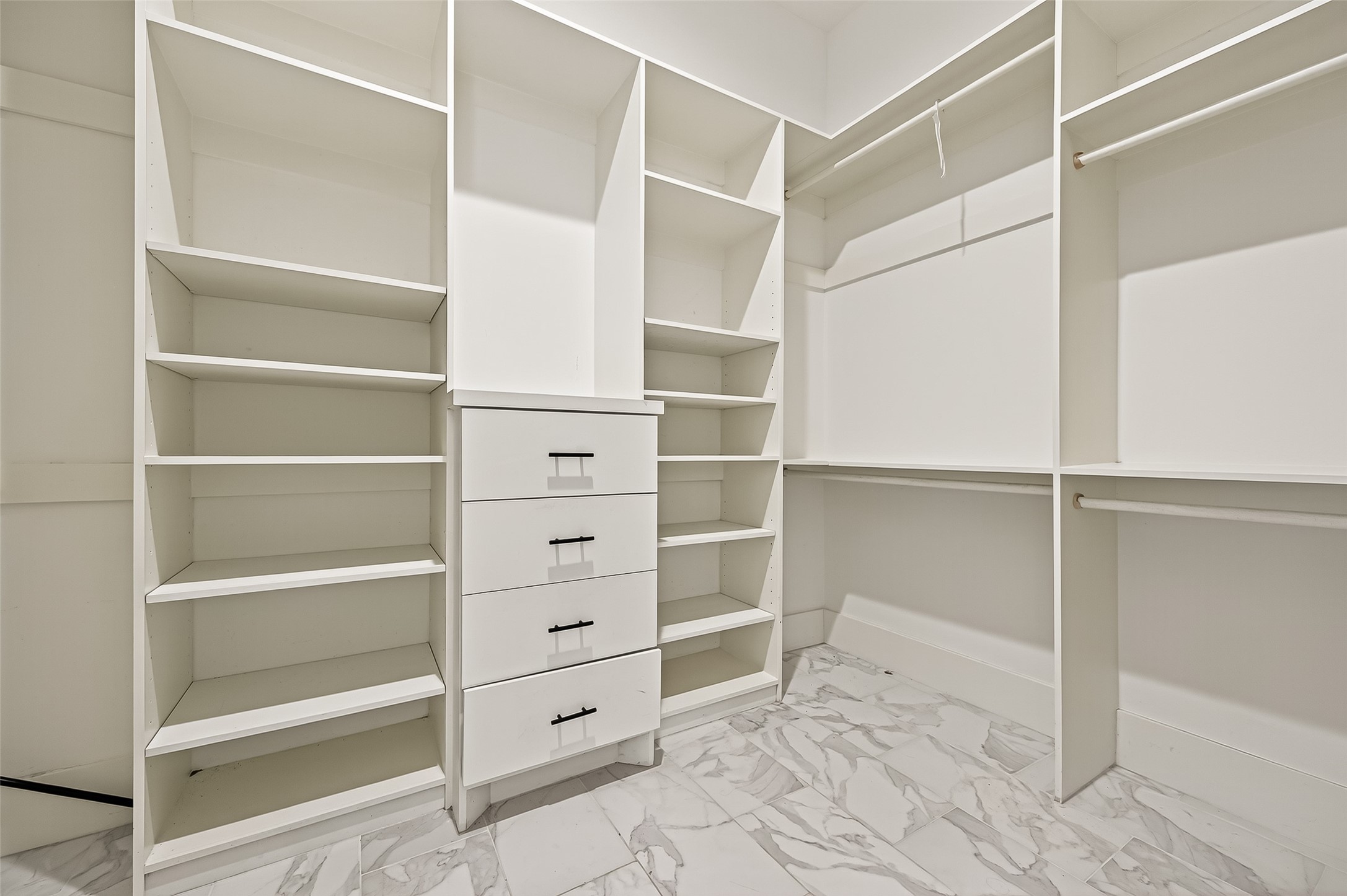 7915 Kirk Road Rosenberg, TX 77471 - Photo 21 of 46 a view of walk in closet with empty racks