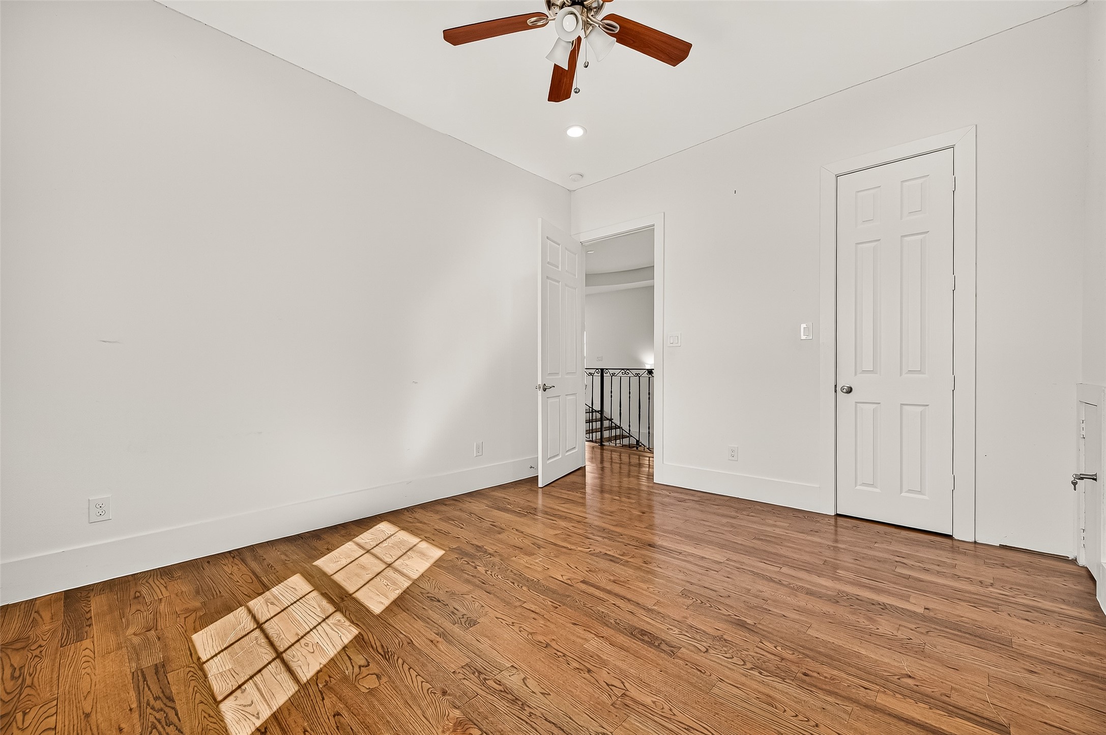 7915 Kirk Road Rosenberg, TX 77471 - Photo 27 of 46 wooden floor in an empty room with a window