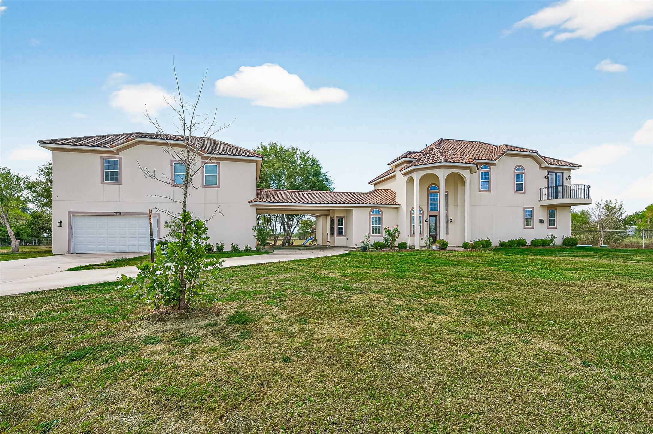 7915 Kirk Road Rosenberg, TX 77471 - Photo 3 of 46 a front view of a house with garden