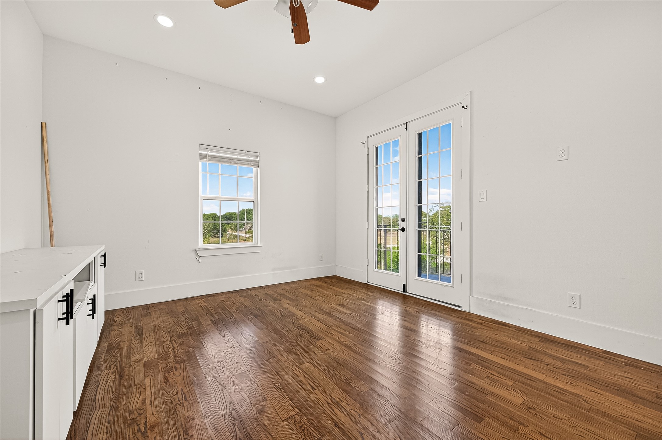 7915 Kirk Road Rosenberg, TX 77471 - Photo 35 of 46 wooden floor in an empty room with a window