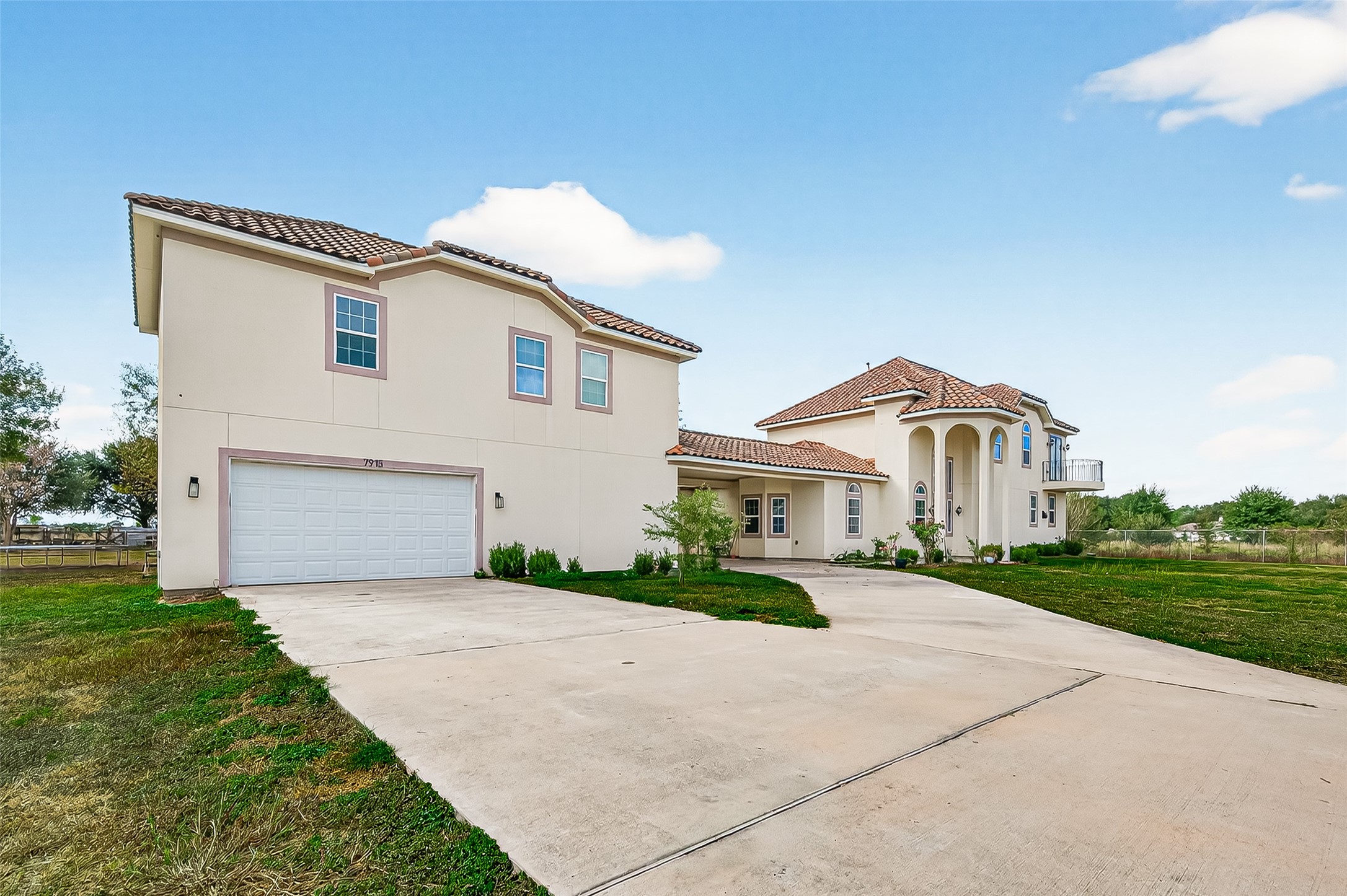 7915 Kirk Road Rosenberg, TX 77471 - Photo 39 of 46 a front view of a house with a garden and pathway